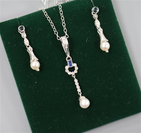 A modern suite of 9ct white gold, sapphire, diamond and cultured pearl jewellery, comprising earrings and pendant necklace.